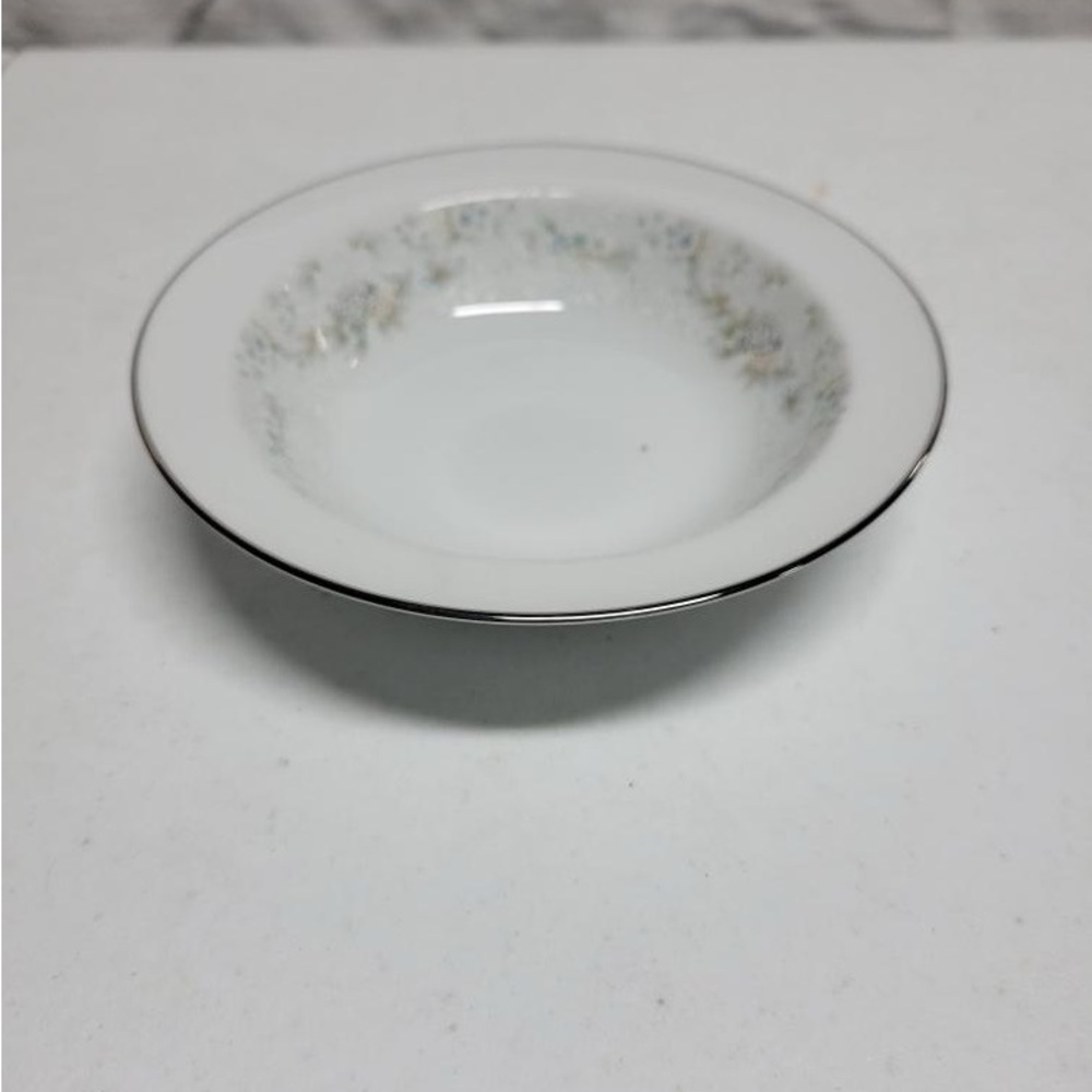 Elegant White and Silver Rimmed Bowl